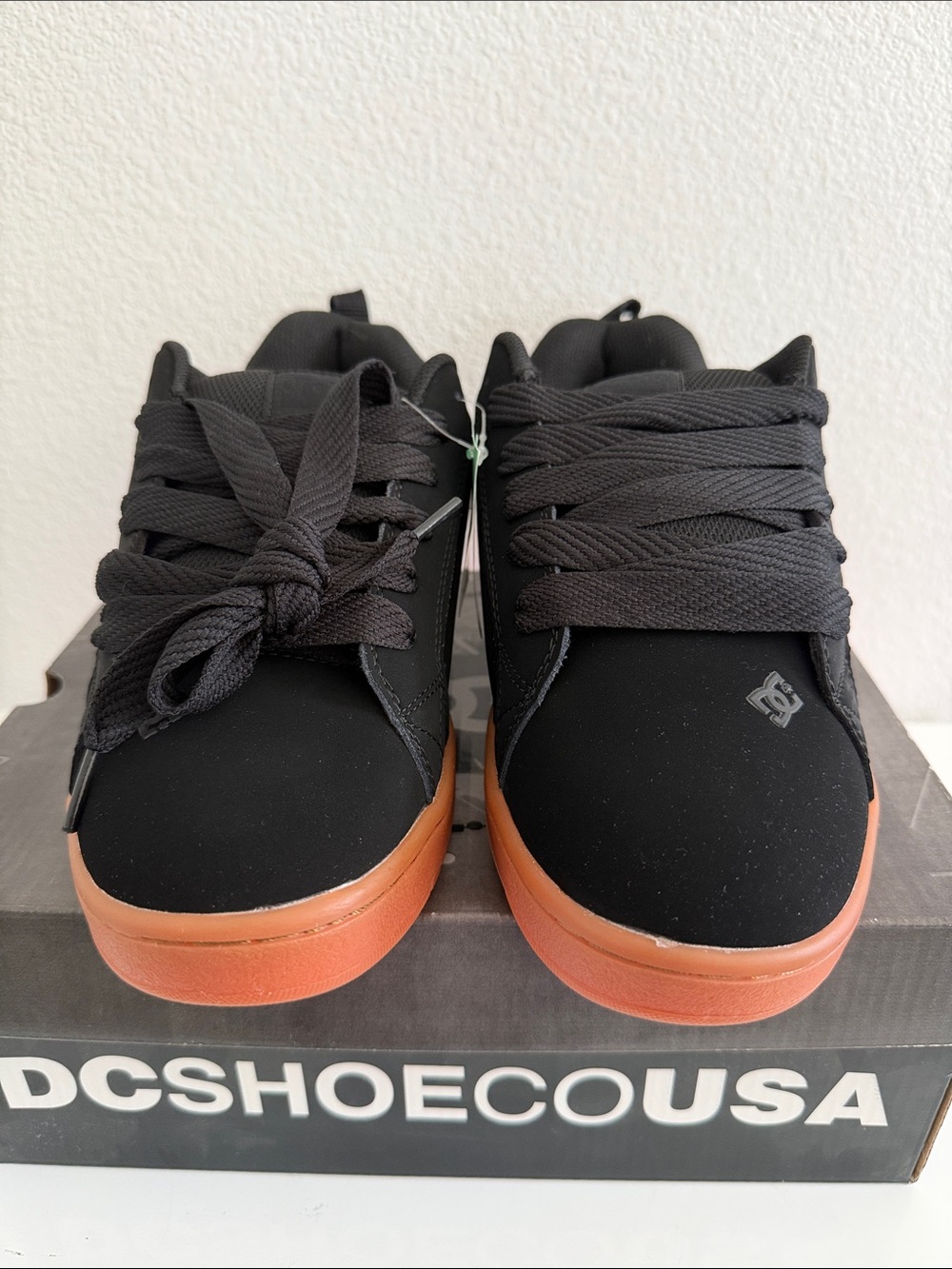 Black DC skate shoes